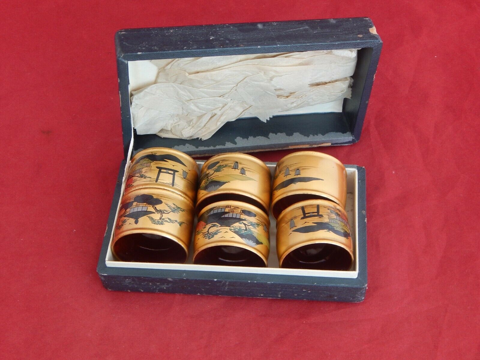 BOXED SET OF (6) JAPANESE PAINTED LAQUER NAPKIN RINGS.